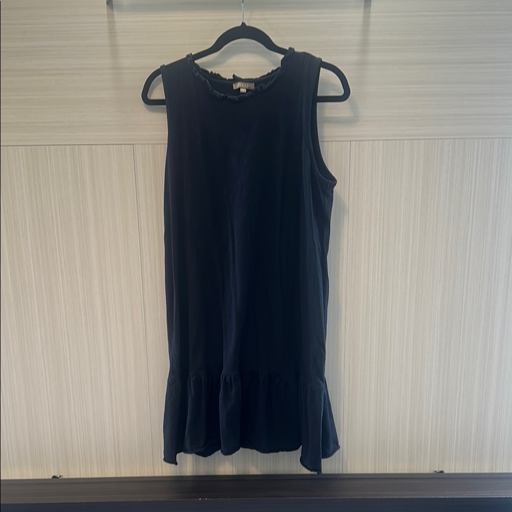 Black Sleeveless Dress with Ruffle Hem and ruffle neck detail